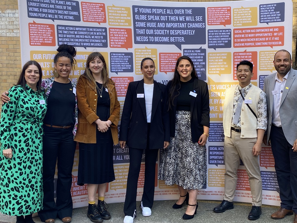 Image of funders, partners and staff at an event